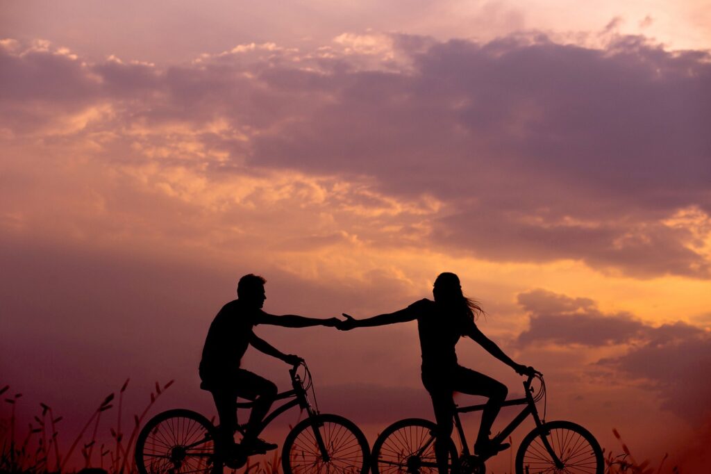 bicycles, couple, silhouettes, biking, bicycle ride, nature, bicycle riding, sunset, dusk, twilight, backlighting, bikes, cyclists, pair, dawn, man, outdoors, people, recreation, sky, sunrise, woman