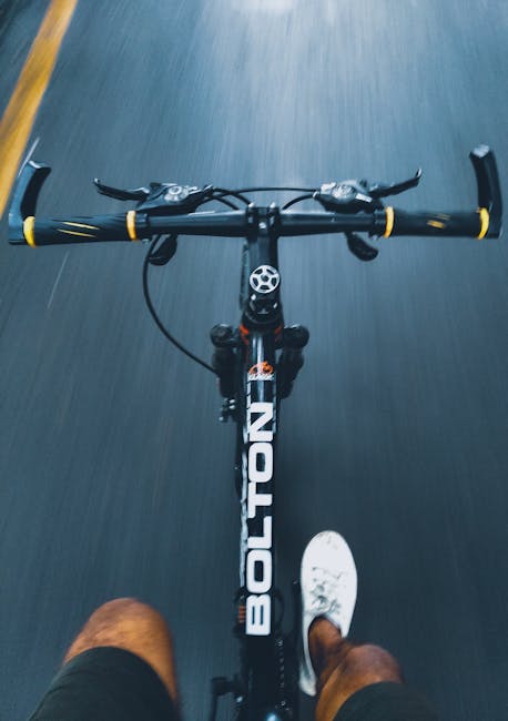POV shot of a cyclist riding through Pune showing motion and adventure.