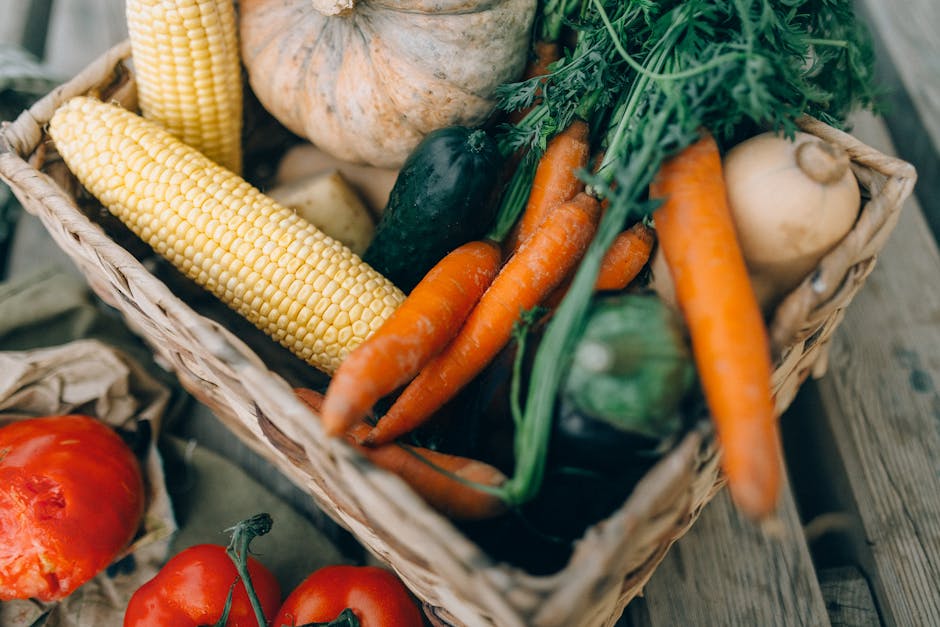 A close-up of fresh organic vegetables in a wicker basket, perfect for healthy eating.